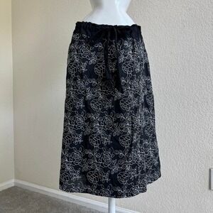 Envision Studio black floral midi skirt